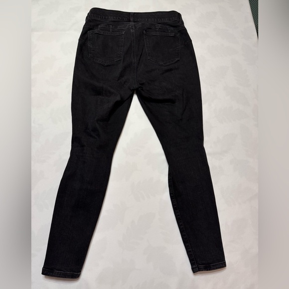 Torrid Black Skinny Jeans with Distressed Knees - Picture 2 of 7